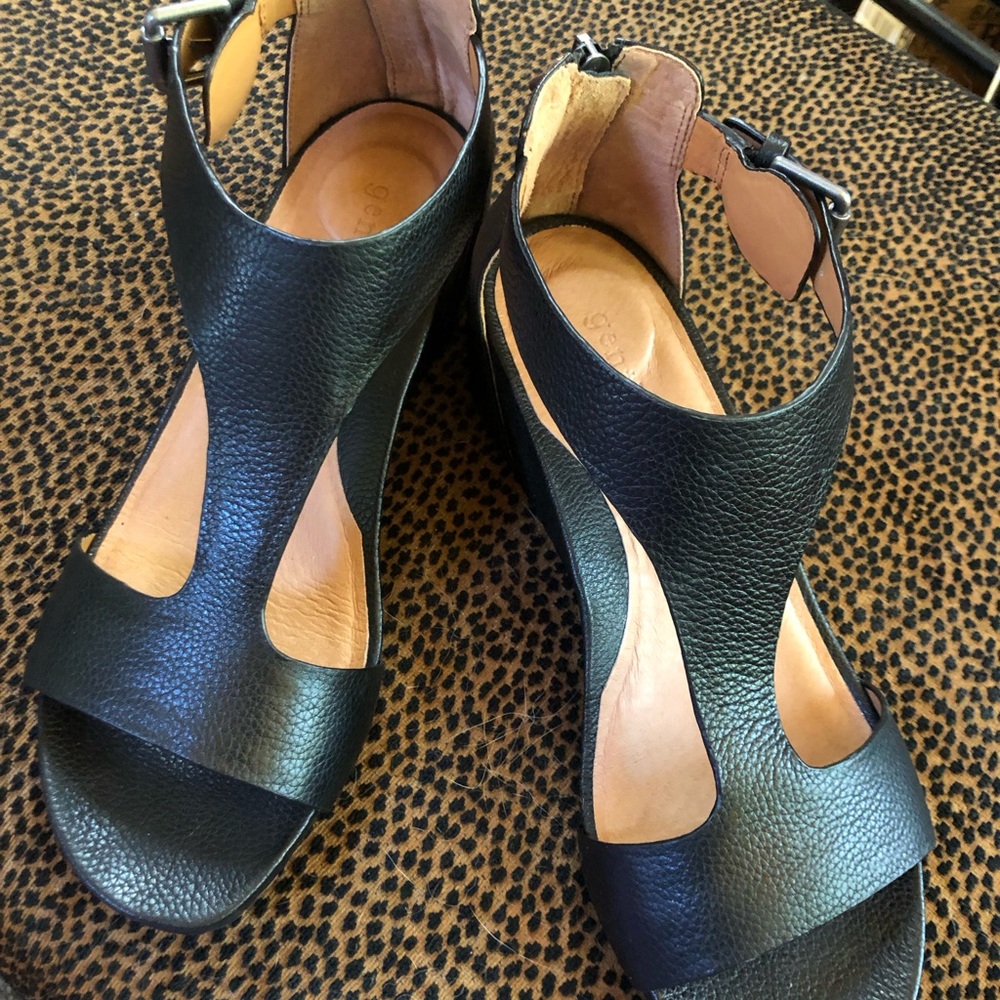 New in box! Beautiful black leather wedge sandals!
Gentle Souls, by Kenneth Cole